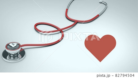 Composition of red heart and stethoscope with copy space on white background 82794504