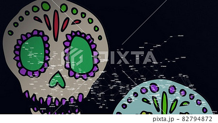 Compostion of network of connections over digital skulls on black background Compostion of network of connections over digital skulls on black background 82794872