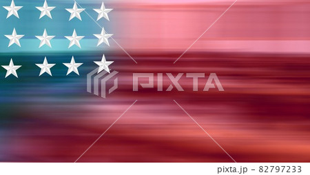 Composition of white stars on blue and blurred red of american flag 82797233