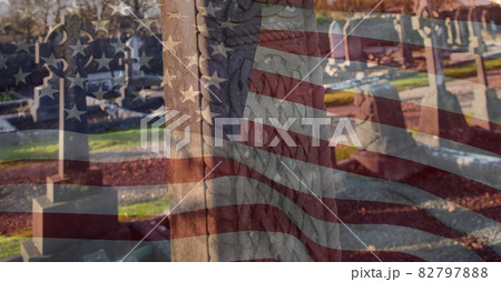 Composition of american flag over cemetery 82797888