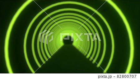 Moving through a tunnel of defocussed concetric green neon arcs pulsating on a black background 82800707
