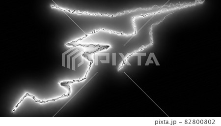 White lightning bolts electrical current zig-zagging wildly across a black background 82800802