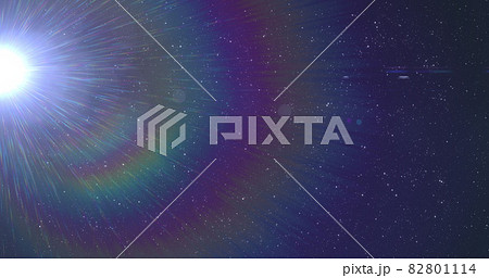 Glowing white spot of light flickering against blue background 82801114