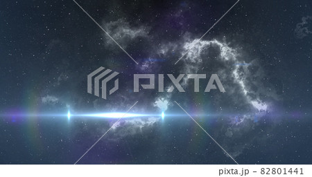 White spot of light moving over white nebula in the night sky 82801441