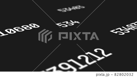 Sets of random numbers with a white font color projected on a black screen background 82802032