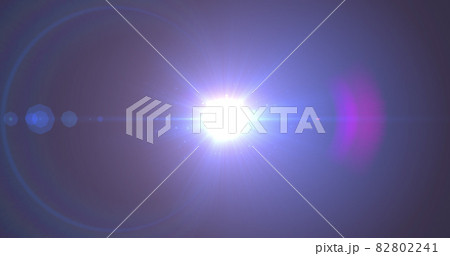Bright blue spot of light glowing against blue background Bright blue spot of light glowing against blue background 82802241