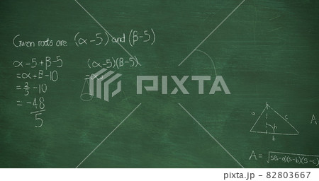 Mathmatical equations written in chalk rising from green chalkboard background 4k Mathmatical equations written in chalk rising from green chalkboard background 4k 82803667