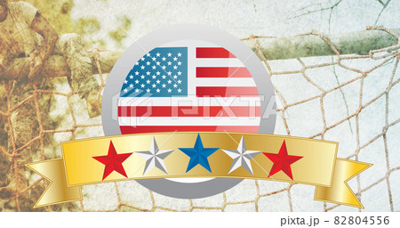 Image of stars on gold banner with american flag, over male soldier climbing assault course Image of stars on gold banner with american flag, over male soldier climbing assault course 82804556