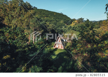 A-Frame cabin in summer morning A-Frame cabin in summer morning 82805515