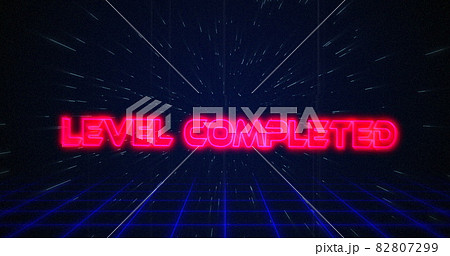 Retro Level Completed text glitching over blue and red lines on white hyperspace effect 82807299