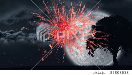Fireworks and silhouette of a tree with the clouds and moon 82808658