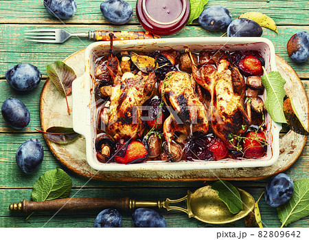 Tasty grilled quails with fall plums. Tasty grilled quails with fall plums. 82809642