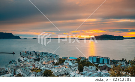 Alesund, Norway. Amazing Natural Bright Dramatic Sky In Warm Colours Above Alesund Valderoya And Islands In Sunset Time. Colorful Sky Background. Beauty In Norwegian Nature. 4K 82812285