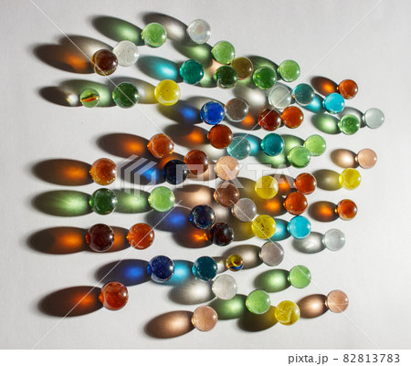 multicolored glass balls on the table 82813783