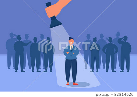Chosen candidate standing under light of flashlight 82814626
