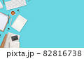 flat lay workspace table with laptop computer, office supplies, coffee cup, tablet and cell phone on green pastel background 82816738