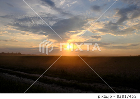 Beautiful sunset in the field. Cloudy sky. Landscape. Beautiful sunset in the field. Cloudy sky. Landscape. 82817455