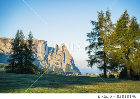Women hiker on trail path and epic landscape of Seceda peak in Dolomites Alps, Odle mountain range, South Tyrol, Italy, Europe Women hiker on trail path and epic landscape of Seceda peak in Dolomites Alps, Odle mountain range, South Tyrol, Italy, Europe 82818146