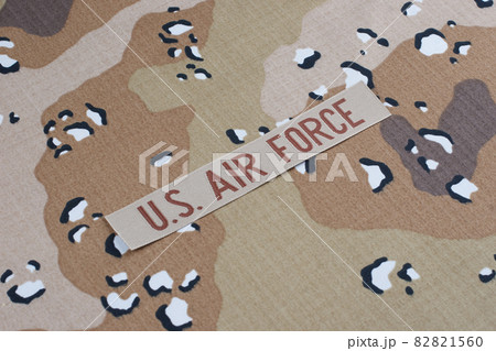 AIR FORCE branch tape on desert camouflage uniform background AIR FORCE branch tape on desert camouflage uniform background 82821560