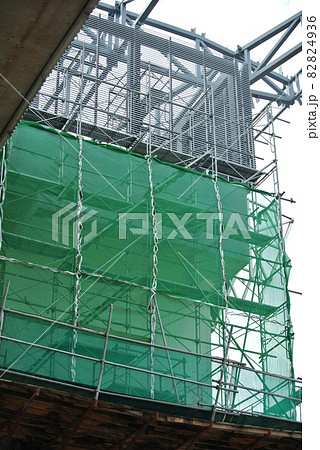 JOHOR, MALAYSIA -APRIL 13, 2016: Scaffolding used as the temporary structure to support platform, form work and structure at the construction site. Also used it as a walking platform for workers.  82824936