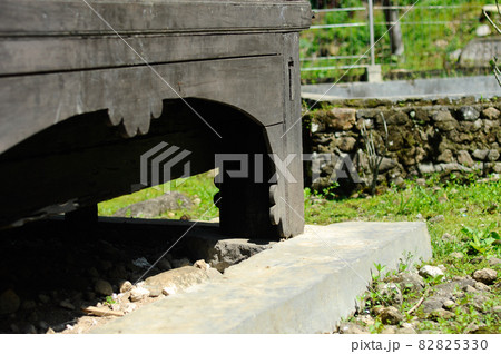 WEST SUMATERA, INDONESIA -JUNE 8, 2014: Architectural detail and wood craft at Tuo Kayu Jao Mosque in West Sumatra, Indonesia. Built in 1599 and is the second oldest mosque in Indonesia. WEST SUMATERA, INDONESIA -JUNE 8, 2014: Architectural detail and wood craft at Tuo Kayu Jao Mosque in West Sumatra, Indonesia. Built in 1599 and is the second oldest mosque in Indonesia. 82825330