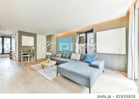 Elegant and spacious living room with beautiful furniture Elegant and spacious living room with beautiful furniture 82830826