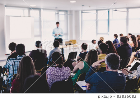 Speaker giving presentation on business conference event 82836082