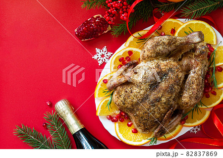 Winter Holiday table Christmas dinner. Baked turkey on red background. Top view flat lay background. Copy space. 82837869