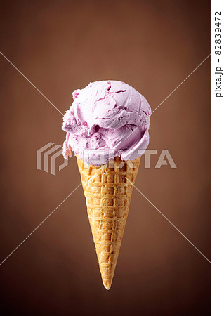 Blueberry ice cream in waffle cone. Blueberry ice cream in waffle cone. 82839472
