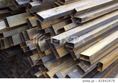 Metal profile pipe of rectangular cross section in packs at the warehouse of metal products Metal profile pipe of rectangular cross section in packs at the warehouse of metal products 82842676