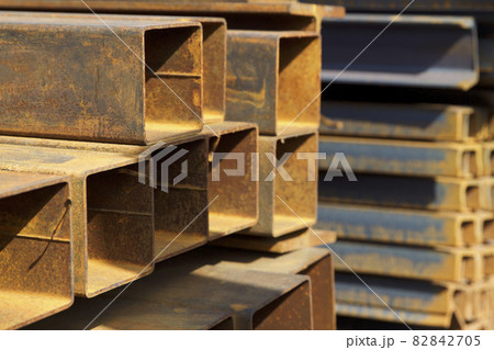 Metal profile pipe of rectangular cross section in packs at the warehouse of metal products Metal profile pipe of rectangular cross section in packs at the warehouse of metal products 82842705