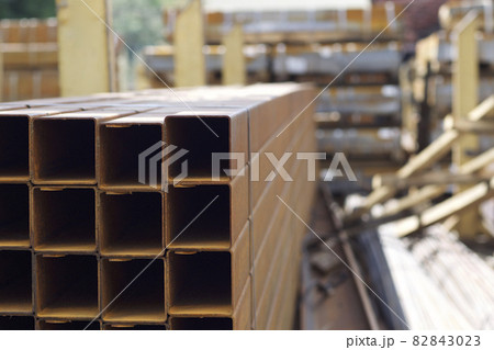 Metal profile pipe of rectangular cross section in packs at the warehouse of metal products Metal profile pipe of rectangular cross section in packs at the warehouse of metal products 82843023