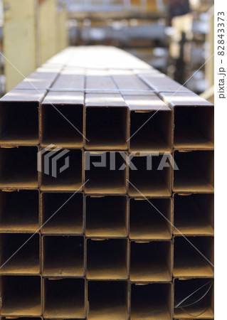 Metal profile pipe of rectangular cross section in packs at the warehouse of metal products 82843373