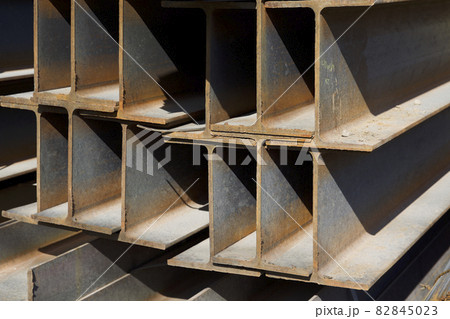Metal profile beam in packs at the warehouse of metal products 82845023