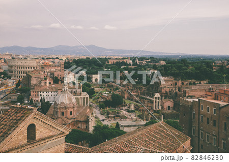Panoramic view of city Rome with Roman forum and Colosseum from Vittoriano 82846230