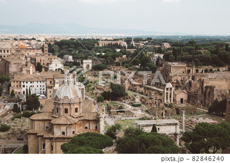 Panoramic view of city Rome with Roman forum and Colosseum from Vittoriano 82846240