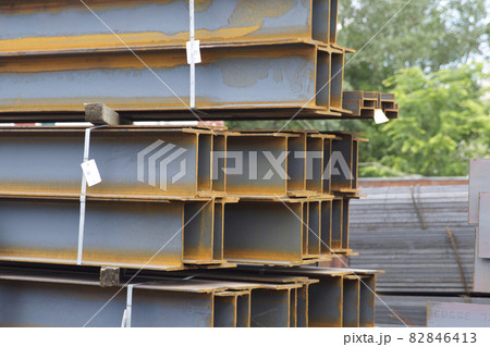 Metal profile beam in packs at the warehouse of metal products Metal profile beam in packs at the warehouse of metal products 82846413