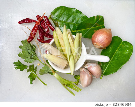 Tom Yum Herbs Thai food, chili, garlic, shallots, coriander, kaffir lime leaves, and lemongrass. on a white background 82846984