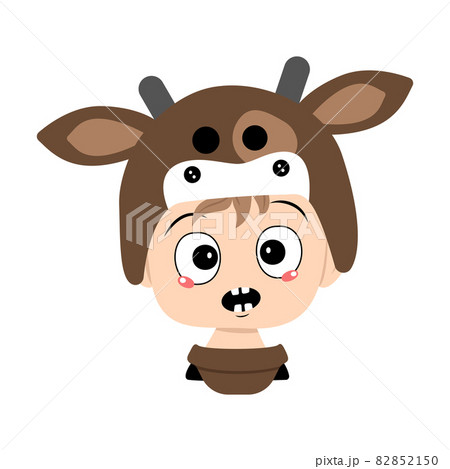 Boy with blonde hair and emotions panic, surprised face, shocked eyes in cow hat. Head of cute child with scared expression in carnival costume for the holiday, Christmas or New year 82852150