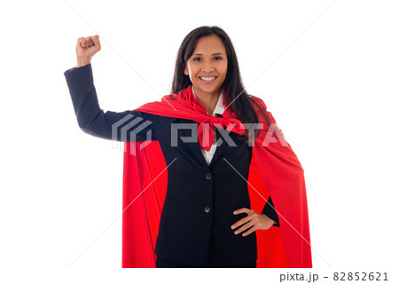 portrait of cheerful asian businesswoman dressed as superhero showing her fist, celebrates her success, isolated on white background 82852621