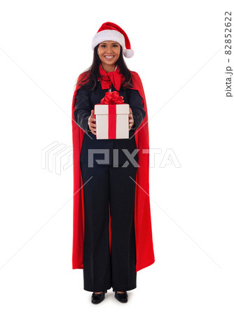 Santa woman standing holding gift box with smile, full lenght.Isolated on white background. Young mixed race Asian, Caucasian model. 82852622