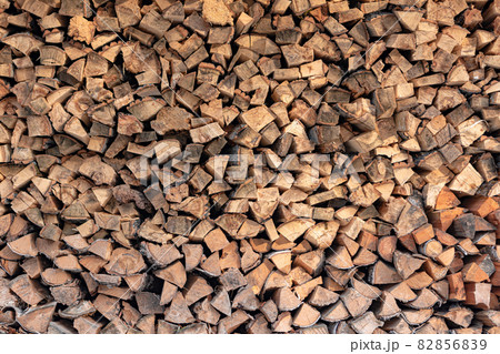 background of firewoods in a woodshed colored 82856839