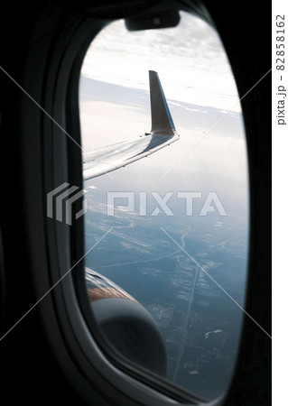View from an airplane window outside at the wing View from an airplane window outside at the wing 82858162