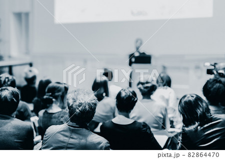 Woman giving presentation on business conference. 82864470