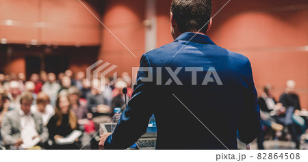Public speaker giving talk at Business Event. Public speaker giving talk at Business Event. 82864508