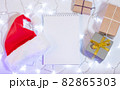 Christmas mockup card with red hat Top view 82865303