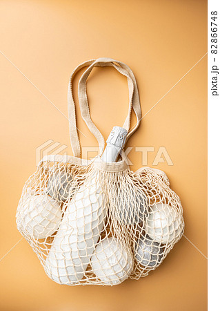 String bag with champagne 82866748