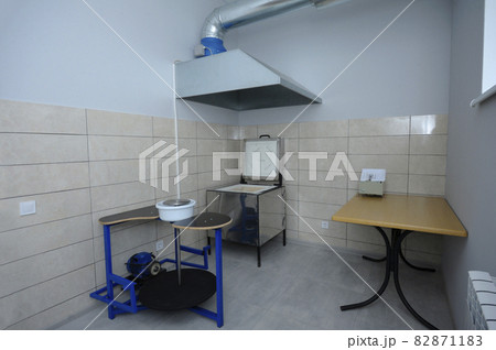 Pottery workhop. Potter wheel, stove, hood and other equipment 82871183