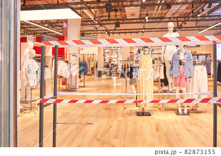 Red risk area. Empty blurry mall background. Defocused wallpaper Red risk area. Empty blurry mall background. Defocused wallpaper 82873155