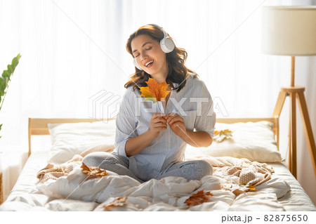 woman enjoying sunny morning woman enjoying sunny morning 82875650